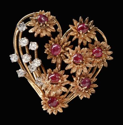 Appraisal: Ruby and diamond heart brooch set with eight mm cabochon