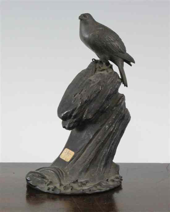 Appraisal: A Japanese bronze figure of a sea eagle perched upon