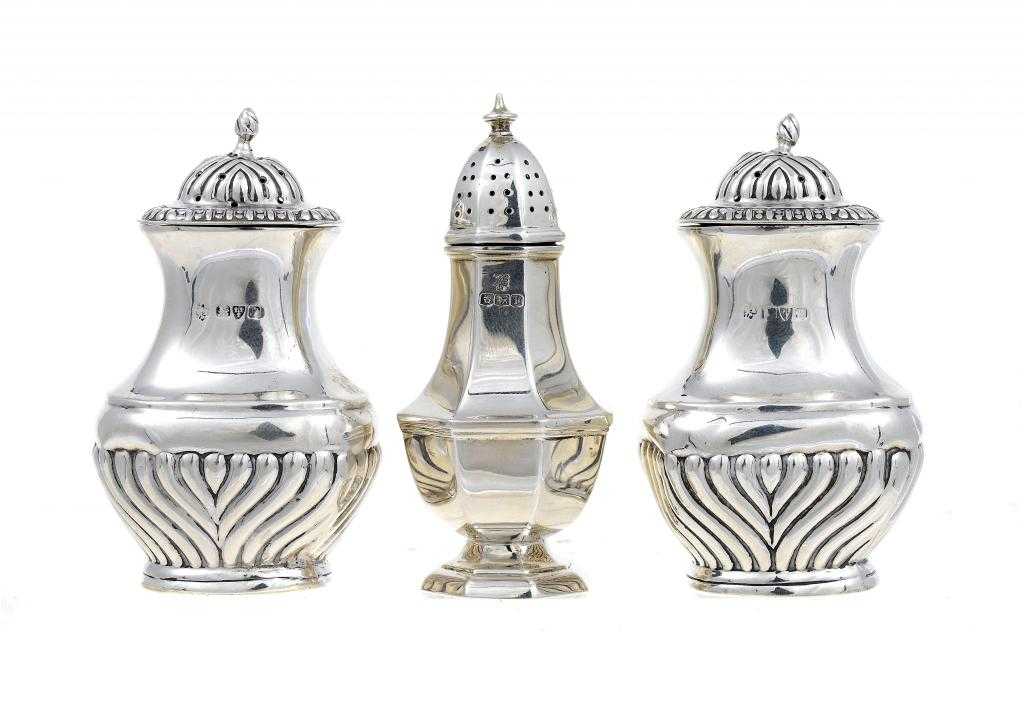 Appraisal: A PAIR OF GEORGE V PEPPERETTES oblong and spirally reeded