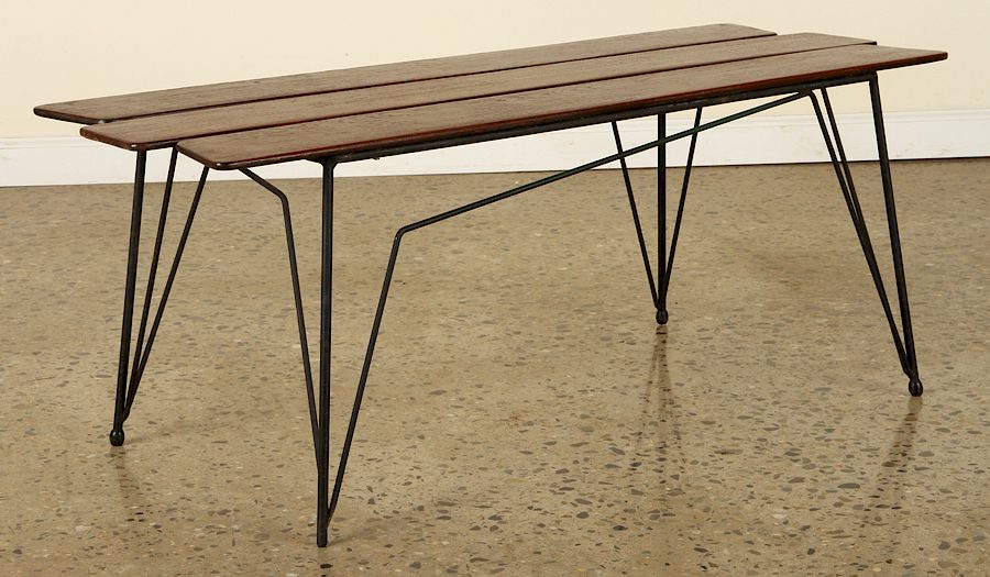 Appraisal: ITALIAN IRON WOOD COFFEE TABLE An Italian iron and wood