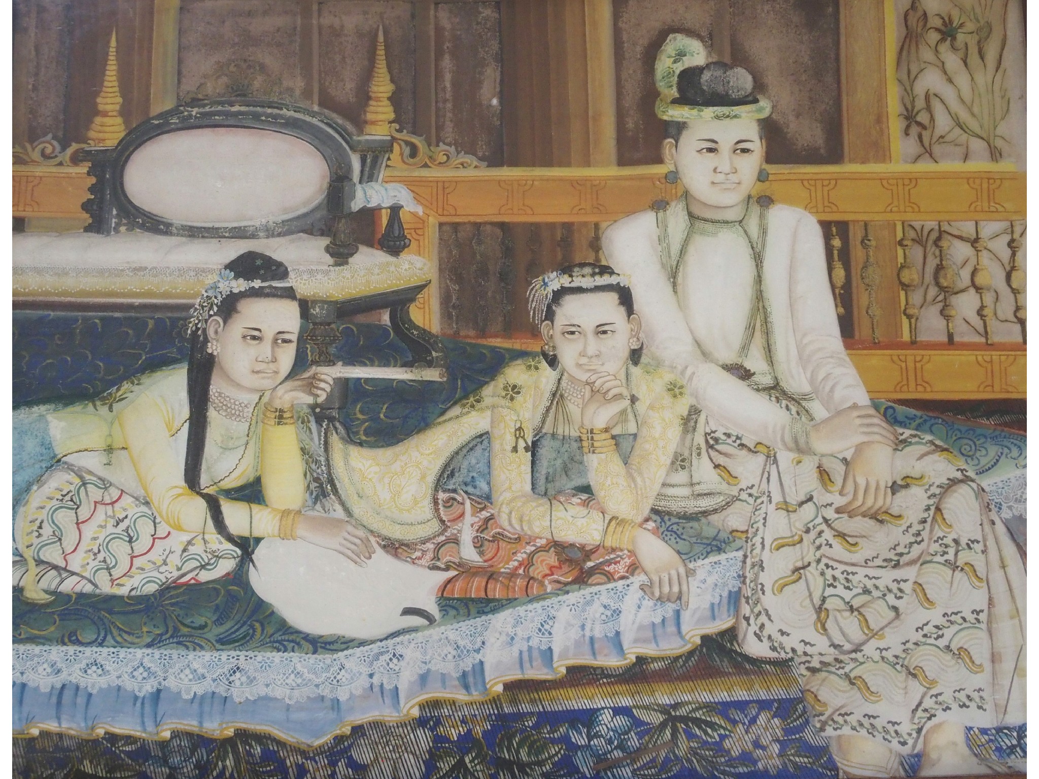 Appraisal: A Burmese portrait painting of a family resting in an