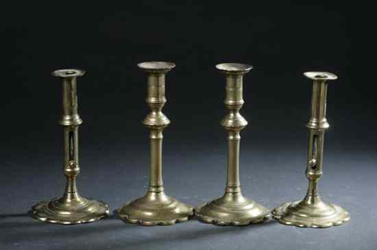 Appraisal: TWO PAIR QUEEN ANNE BRASS CANDLESTICKS early-to-mid th century Including