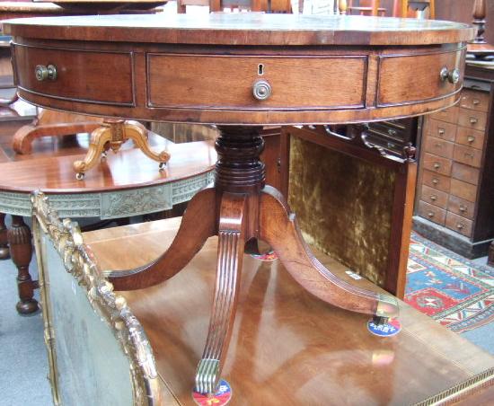 Appraisal: A George IV mahogany drum table the green leather inset