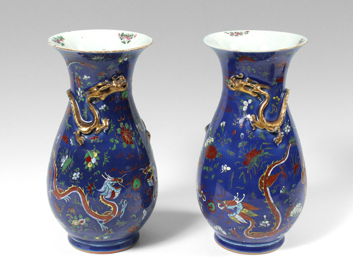 Appraisal: PAIR ORIENTAL DRAGON VASES Blue ground with enamel floral and