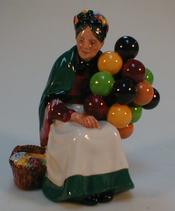 Appraisal: A Royal Doulton figurine The Old Balloon Seller HN