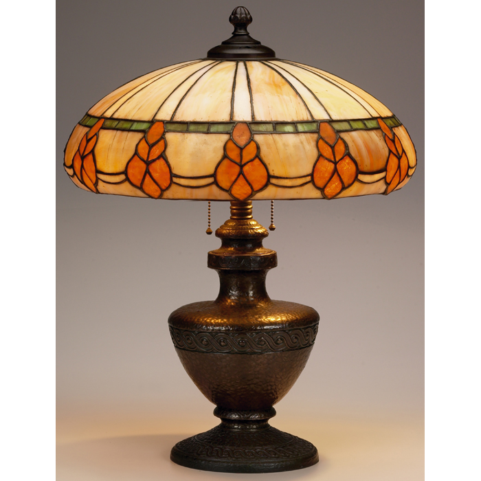 Appraisal: Classique table lamp bronzed metal base supporting a leaded glass