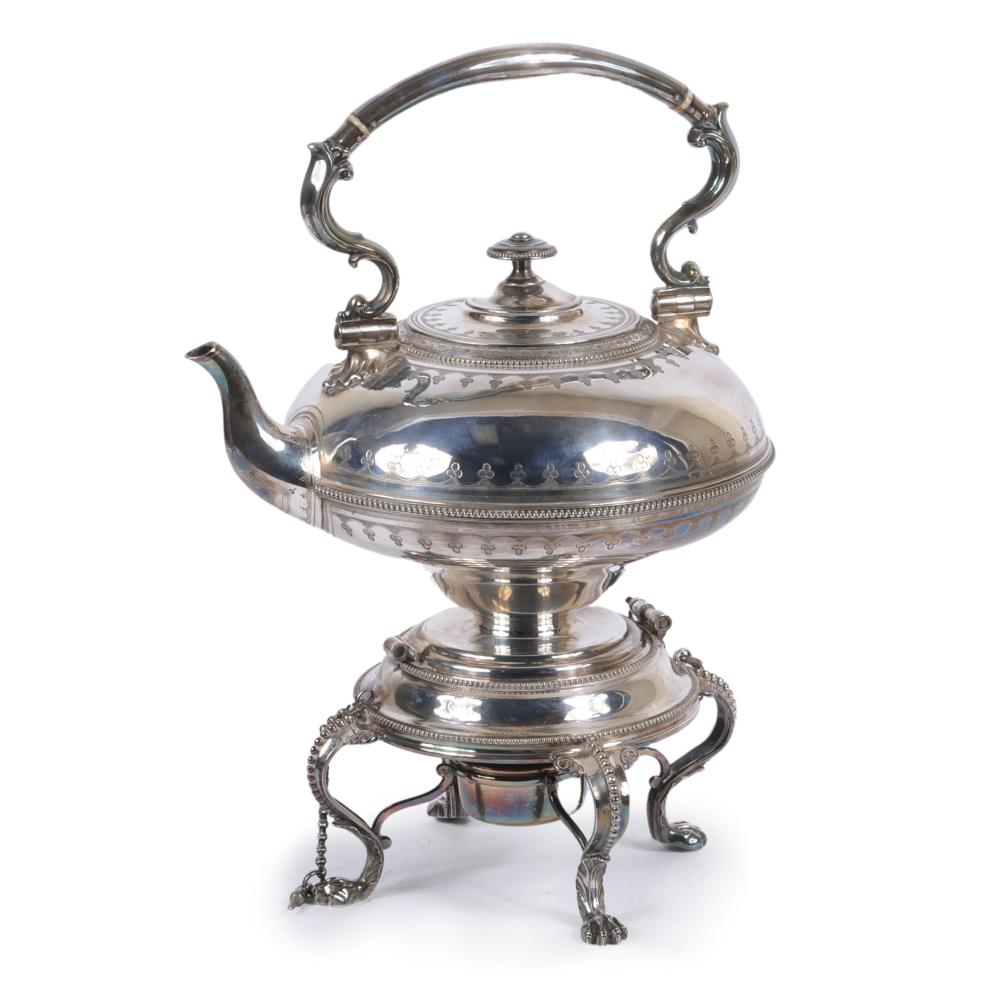 Appraisal: ELKINGTON CO ENGLISH SILVERPLATED TEAPOT ON WARMER STAND LONDON CA