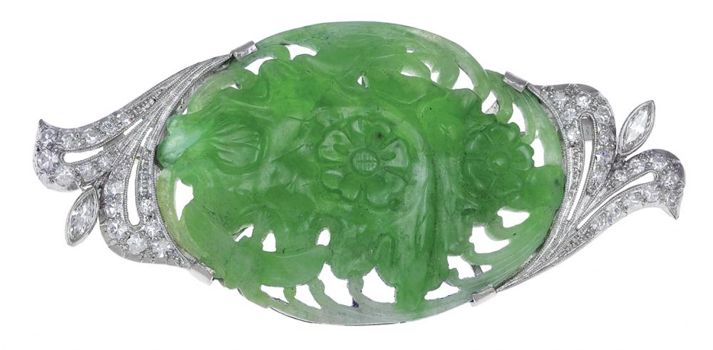 Appraisal: A JADE AND DIAMOND BROOCH The central carved floral and