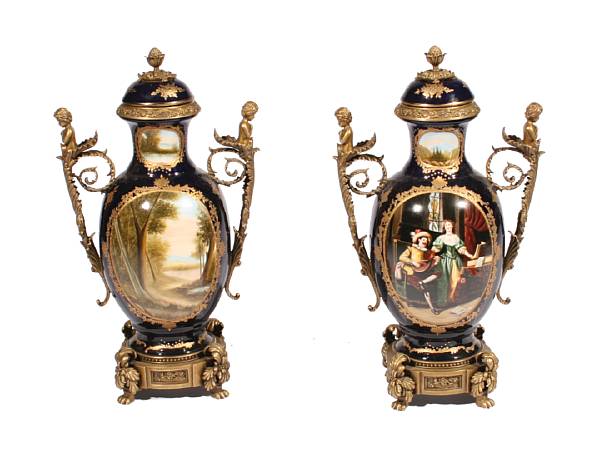 Appraisal: A pair of Sevres style bronze mounted porcelain covered vases