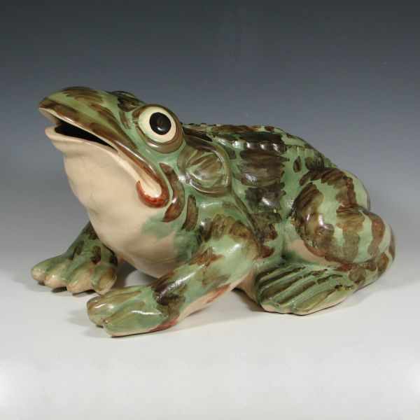 Appraisal: Brush lawn sprinkler frog with an open mouth and a