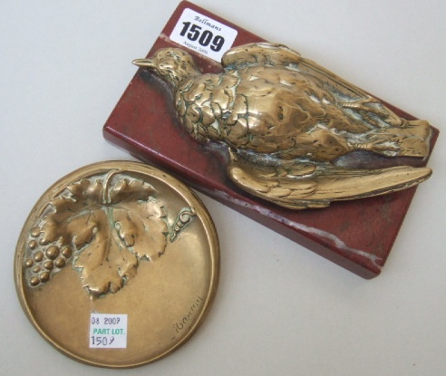 Appraisal: After Mene a brass partridge mounted on red vein marble