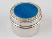 Appraisal: A silver pillbox with turquoise guilloche enamelled hinged lid Birmingham