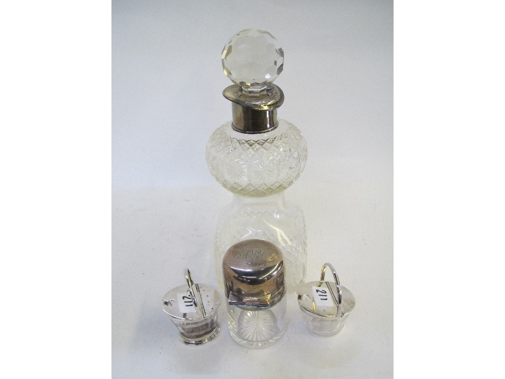 Appraisal: A lot comprising a silver mounted decanter Birmingham a silver