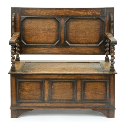 Appraisal: An oak monks bench c with panelled front cm h