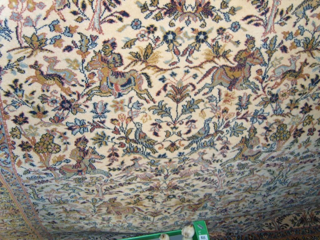 Appraisal: A cream ground Persian style wool carpet with all over