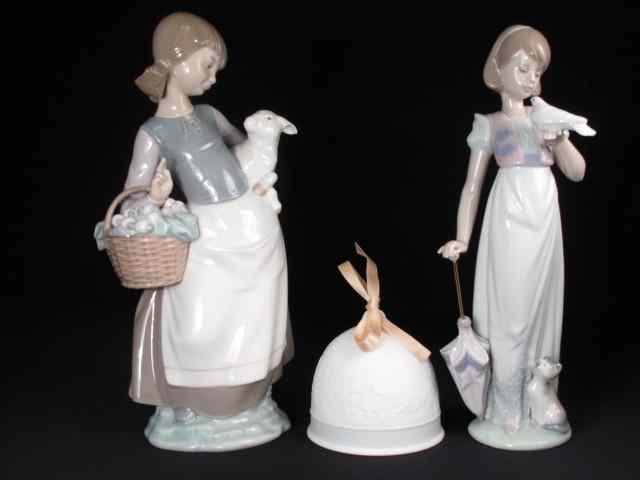 Appraisal: Two Lladro porcelain figurines Includes ''Summer stroll'' ''Girl with Lamb