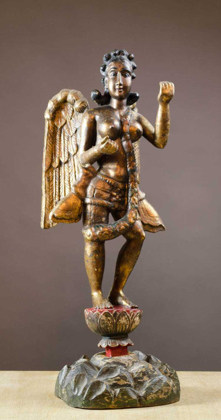 Appraisal: CARVED AND PAINTED WOOD GARUDA FIGURE Burma th c anthropomorphic