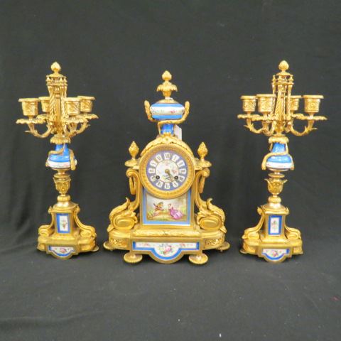 Appraisal: Sevres Porcelain Bronze Clock Set fine handpainted scene of courting