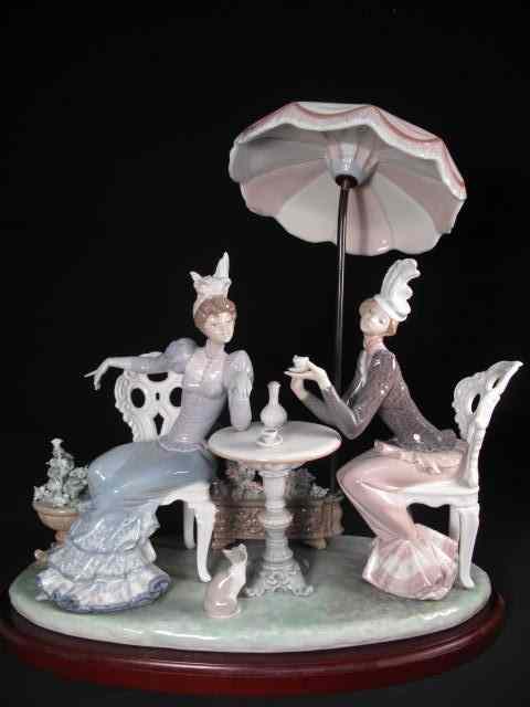 Appraisal: Lladro porcelain figure ''Cafe de Paris'' On wooden base Marked