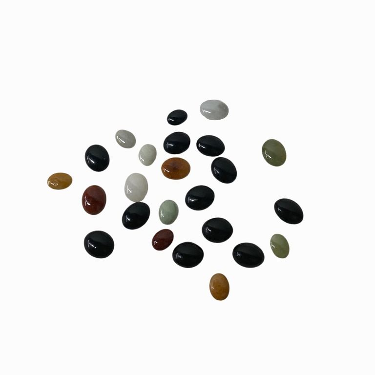 Appraisal: Black Burmese Small Jade Cabochons Black Burmese Small Jade Cabochons