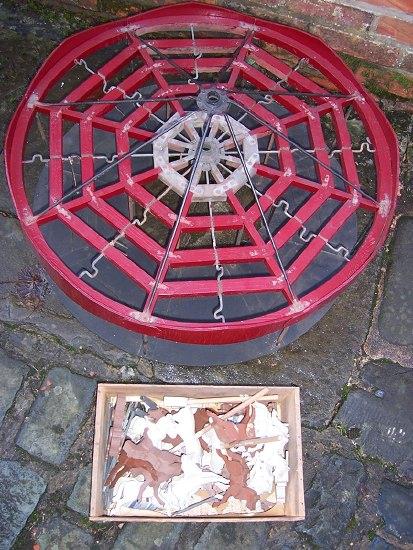 Appraisal: A model merry-go-round the painted wood frame with metal struts