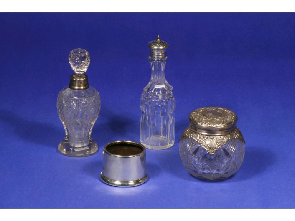 Appraisal: A SMALL COLLECTION OF GLASS MOUNTED SILVER BOTTLES AND JARS