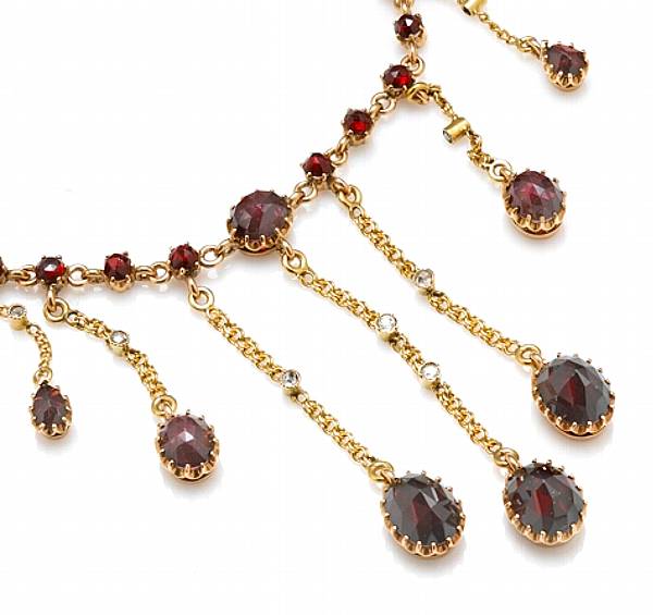 Appraisal: A garnet diamond and k gold necklace length in