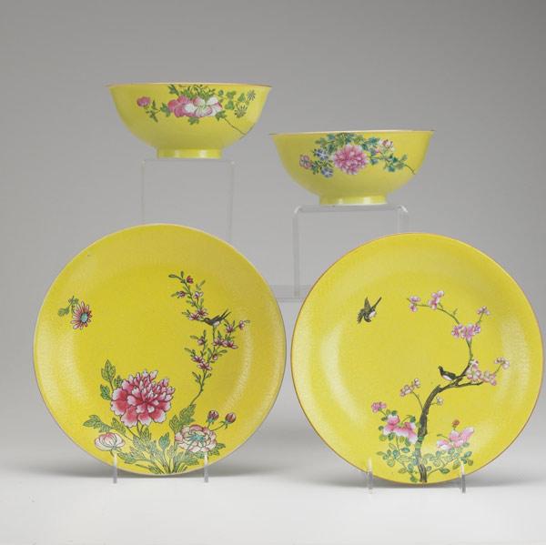 Appraisal: CHINESE PORCELAIN Grouping of four yellow-glazed and incised pieces includes