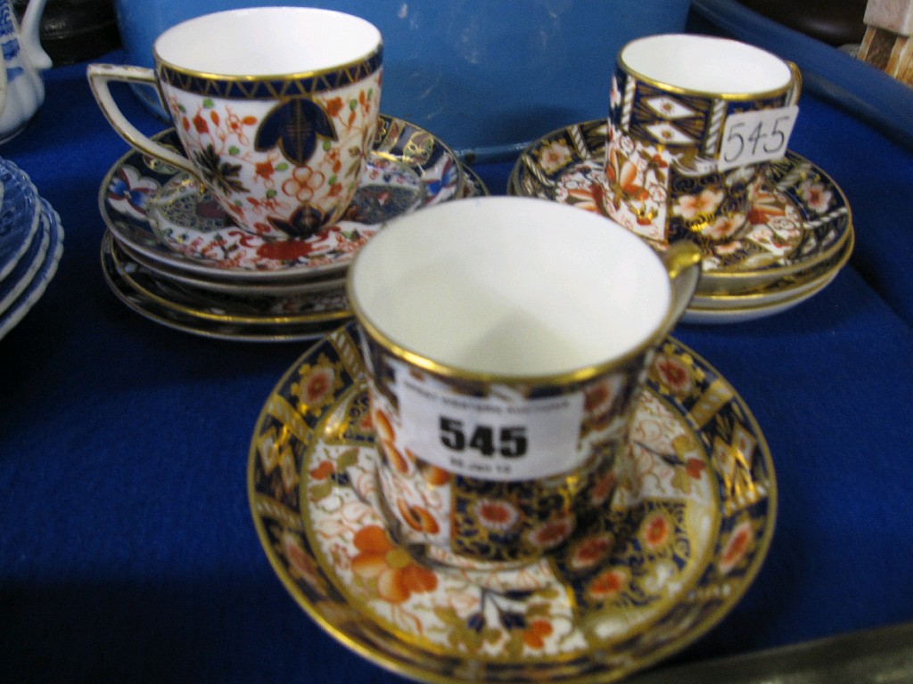 Appraisal: Lot comprising two Royal Crown Derby coffee cups and one