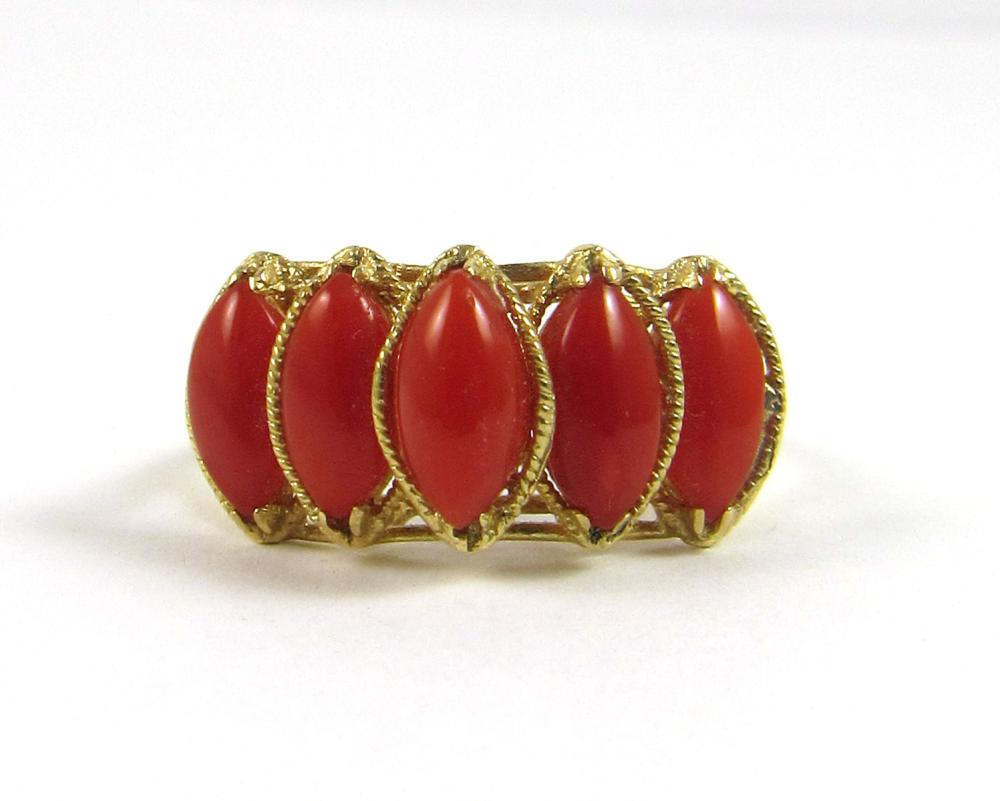 Appraisal: CORAL AND FOURTEEN KARAT GOLD RING prong set with five