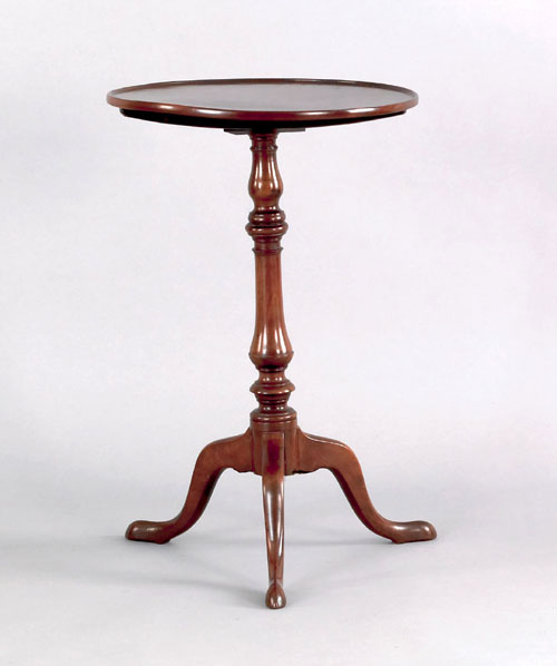 Appraisal: George II mahogany candlestand ca the tilt top above a