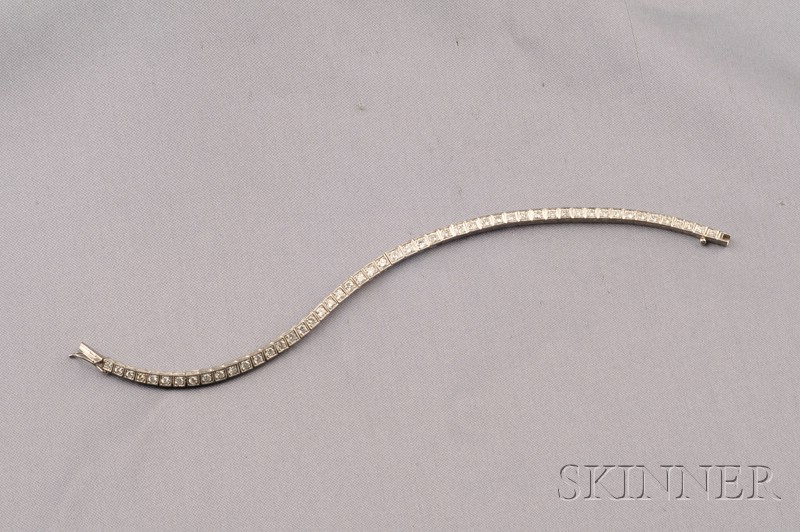 Appraisal: Platinum and Diamond Line Bracelet the slightly tapering form set