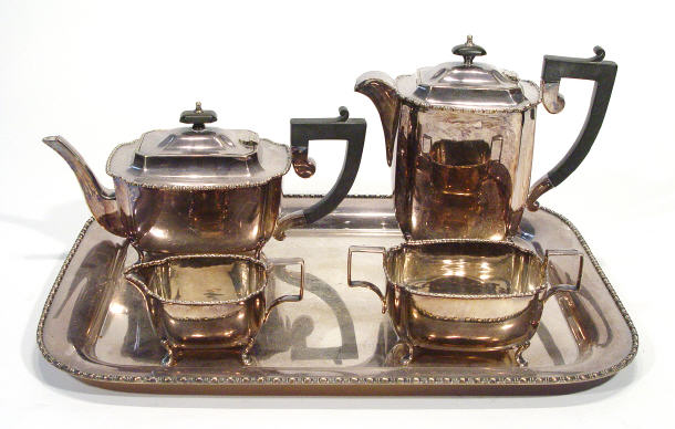 Appraisal: Four piece silver plated teaset with ebony knops and handles