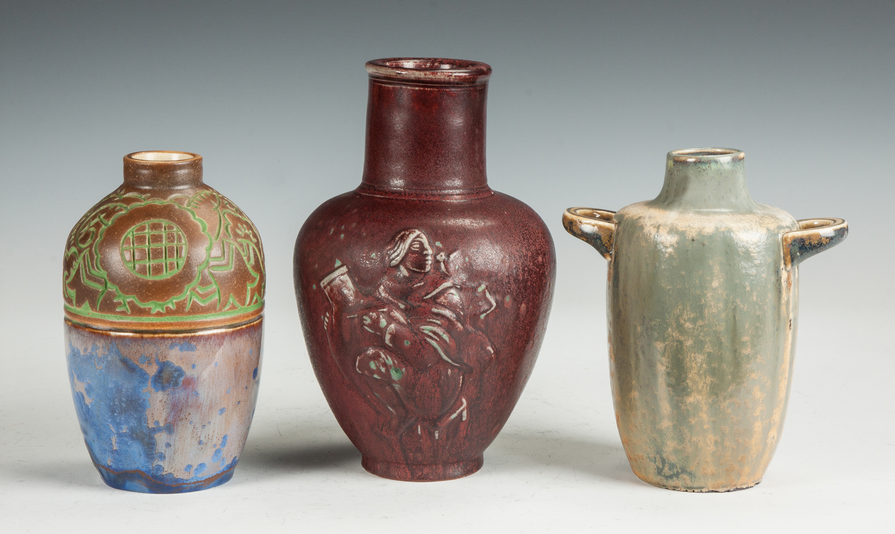 Appraisal: Three Art Pottery Vases Early th cent L to R