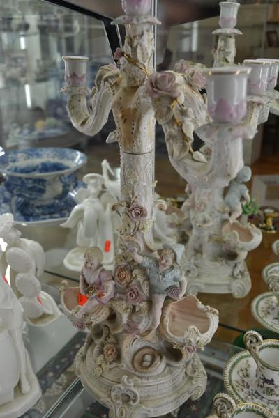 Appraisal: CONTINENTAL BISQUE PORCELAIN CANDELABRA DAMAGE AND RESTORATION A F