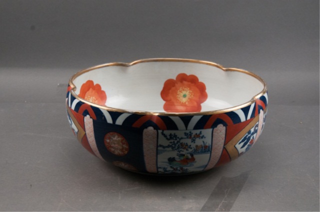 Appraisal: Imari Style Orange and Blue Bowl Gentle scalloped rim Decorated