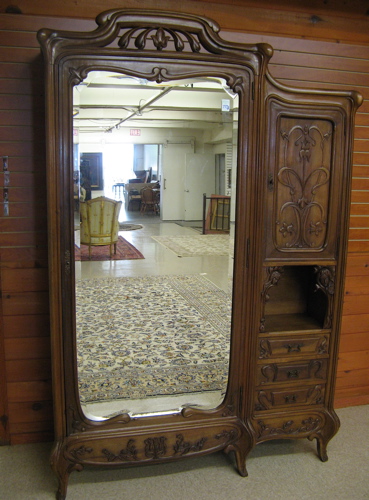 Appraisal: AN ART NOUVEAU WALNUT ARMOIRE French c - having a