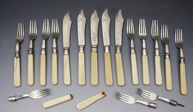 Appraisal: A SET OF FIVE VICTORIAN SILVER BLADED FISH KNIVES with