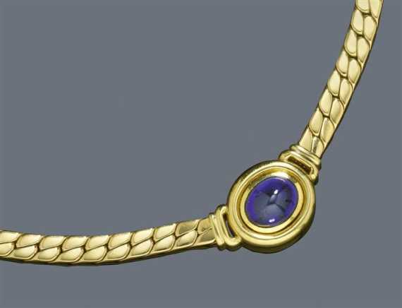 Appraisal: GOLD AND TANZANITE NECKLACE Yellow gold g Casual-elegant classic flat