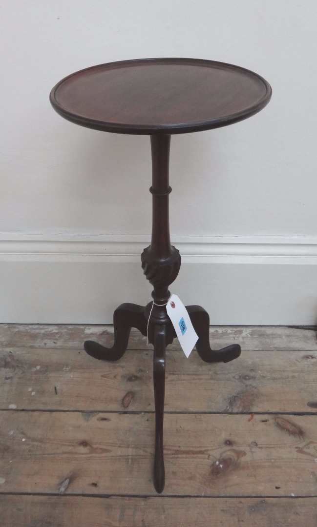 Appraisal: A George III style mahogany wine table early th century