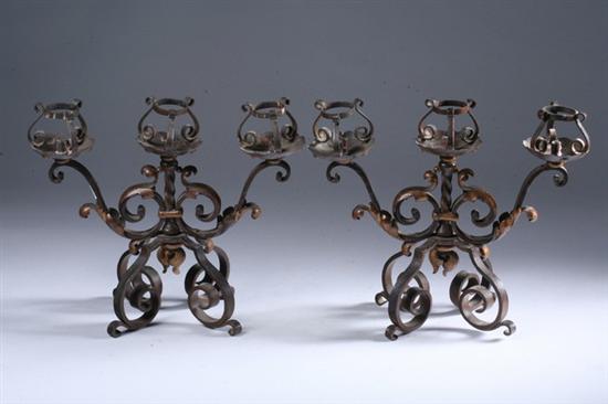 Appraisal: PAIR LOUIS XV-STYLE WROUGHT IRON THREE-LIGHT CANDELABRA early th century