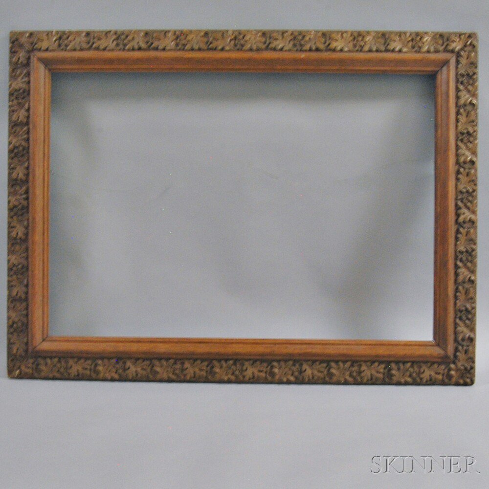 Appraisal: Aesthetic Acorn-carved Frame late th early th century the rectangular