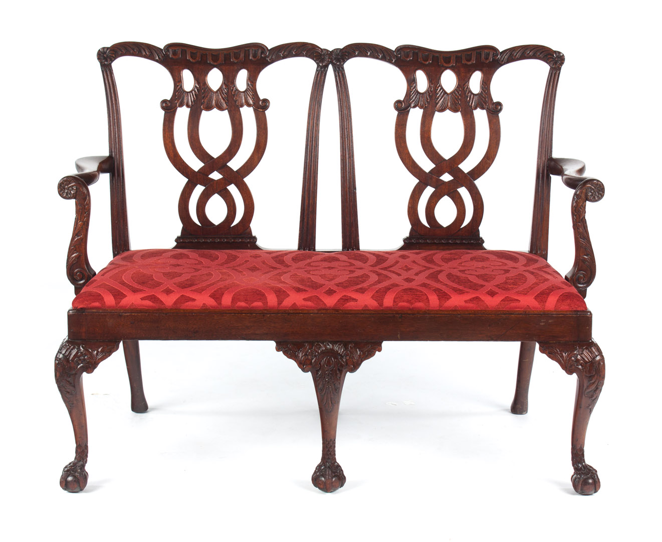 Appraisal: Chippendale style carved mahogany settee th century double openworked chair