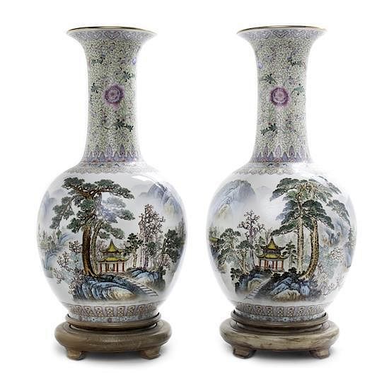 Appraisal: A Pair of Polychrome Porcelain Bottle Vases Height inches without