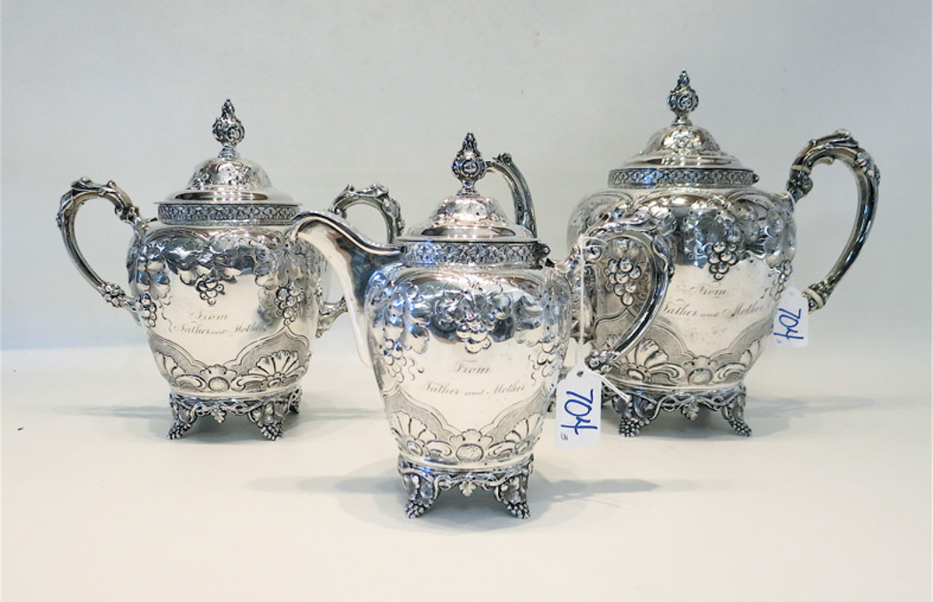 Appraisal: WOOD HUGHES COIN SILVER COFFEE SERVICE three pieces with repousse