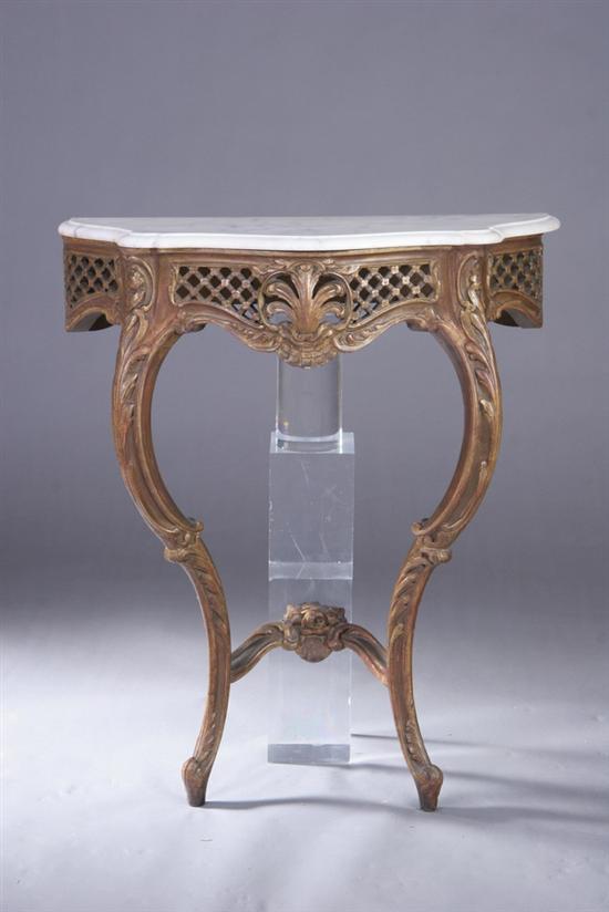 Appraisal: LOUIS XV STYLE GILTWOOD CONSOLE th century Serpentine carrara slab