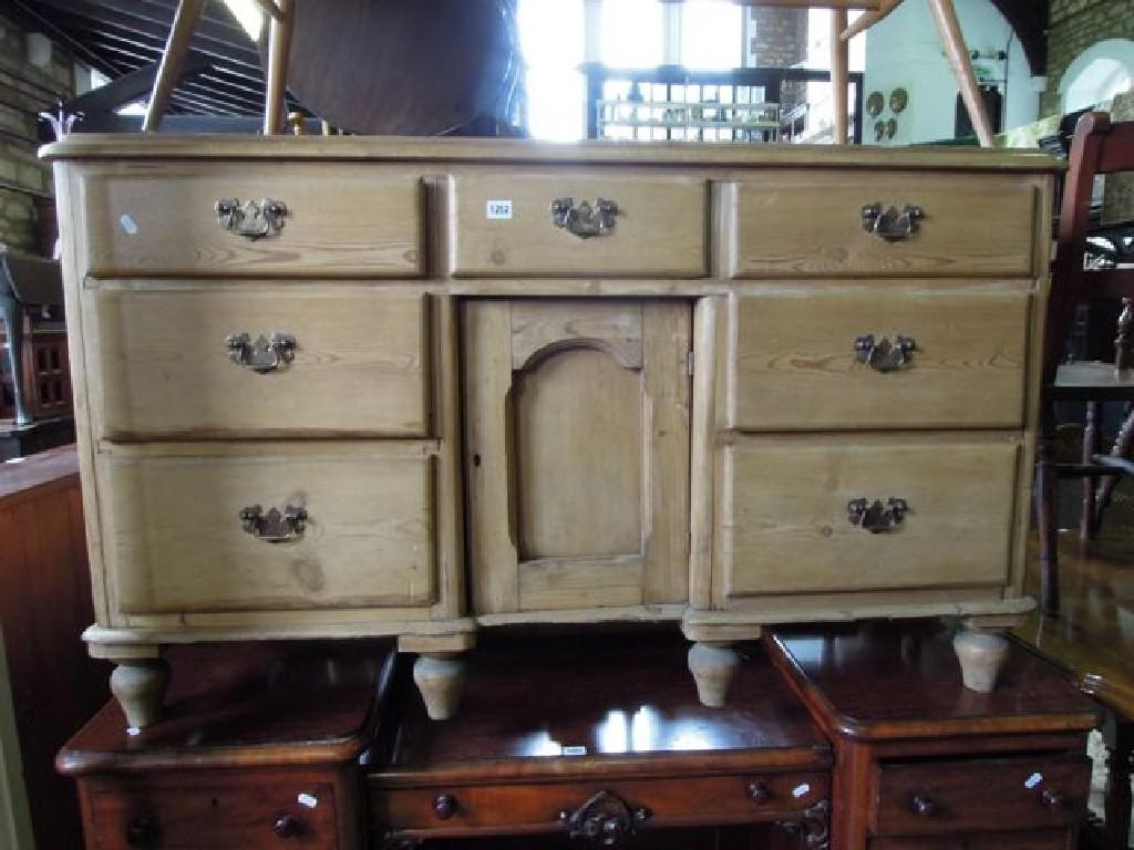 Appraisal: A Victorian stripped pine dresser base fitted with an arrangement