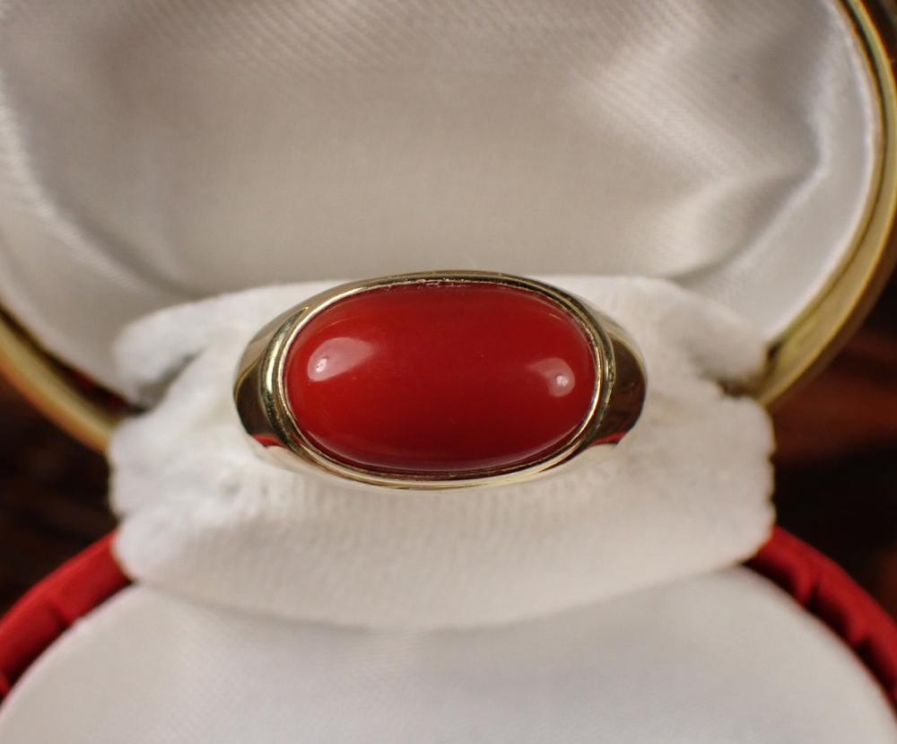 Appraisal: RED CORAL AND FOURTEEN KARAT GOLD RING The k yellow