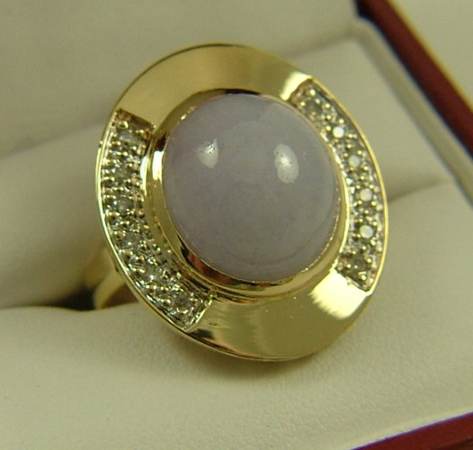 Appraisal: LAVENDER JADE AND DIAMOND RING K yellow gold