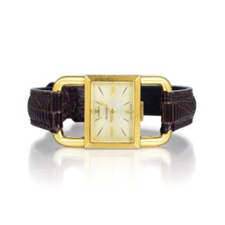 Appraisal: Hermes Jaeger Featuring a rectangular K yellow gold case with